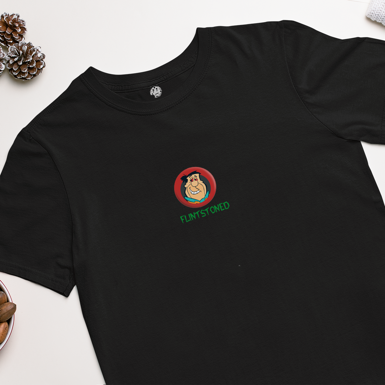 flintstone character badge on black t-shirt
