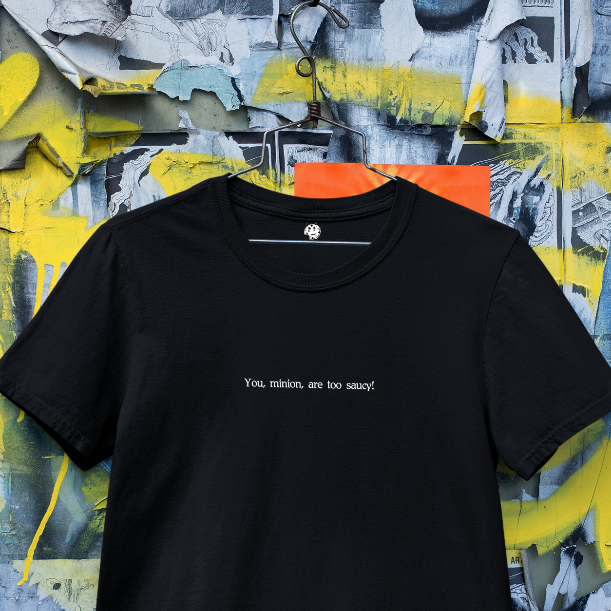 The Two Gentlemen of Verona, Act I, Scene II Shakespearean insult on black t-shirt hanging.